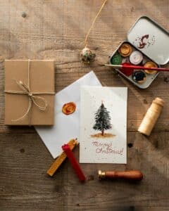 a christmas card with a christmas tree on it